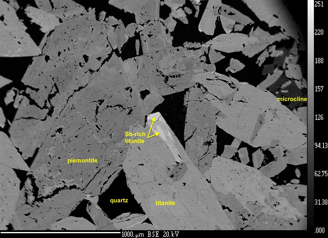 BSE image of the mineralogy in thin section FKM-2, highlighting unusual Sb-rich zones in titanite