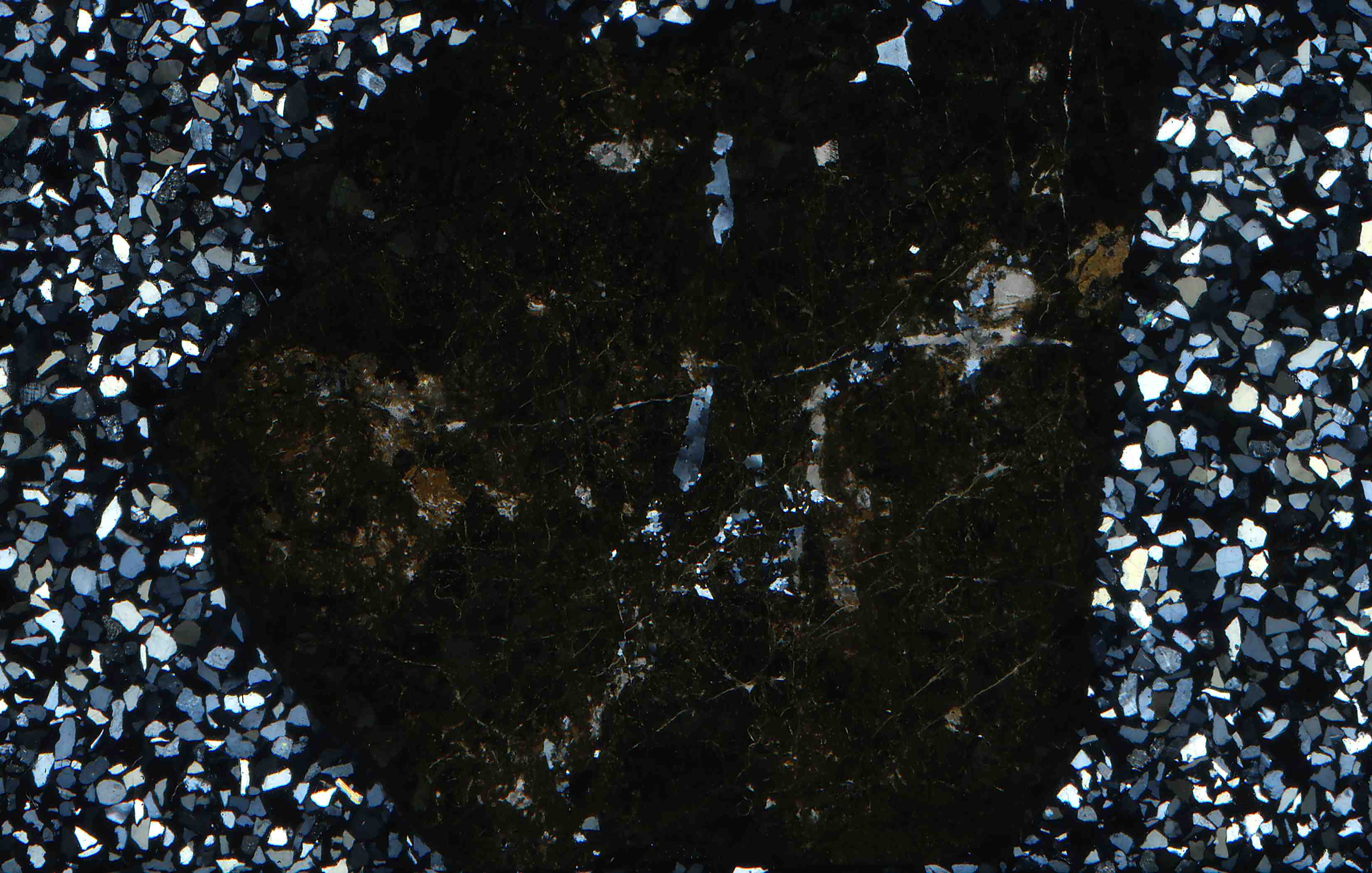 Switzerland calderite in thin section
