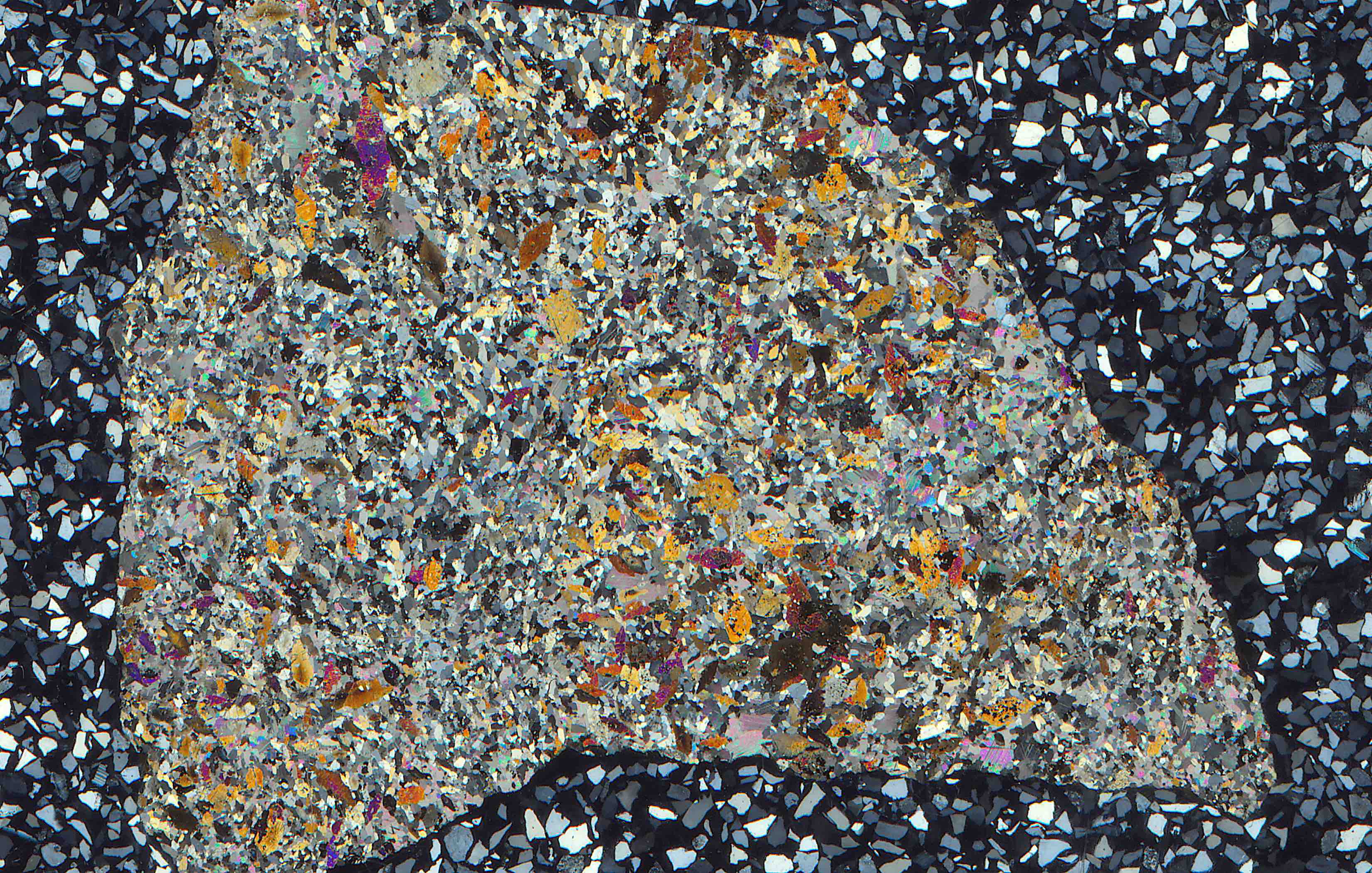 caryinite in thin section from Långban Sweden