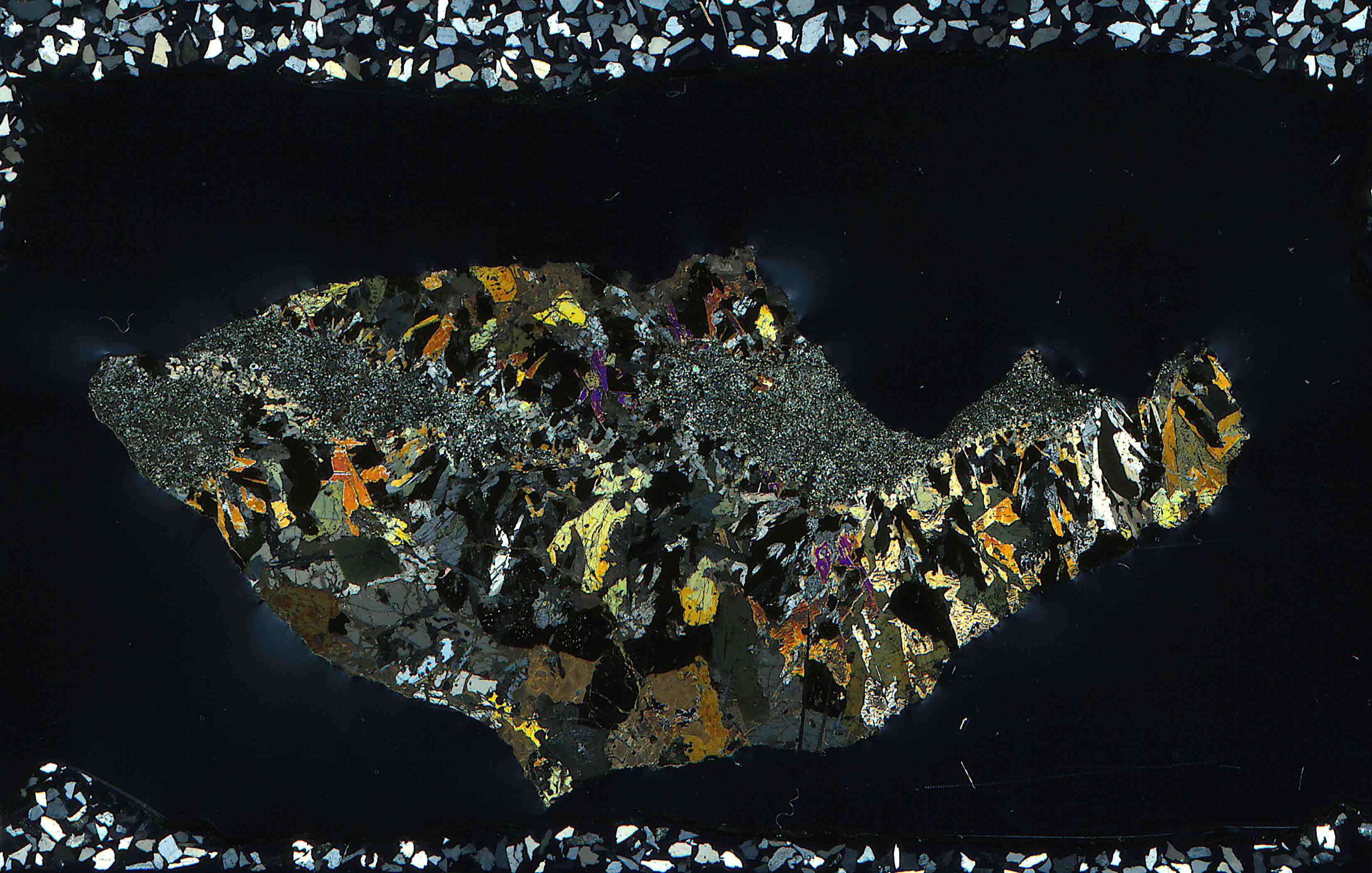 nagelschmidtite in thin section